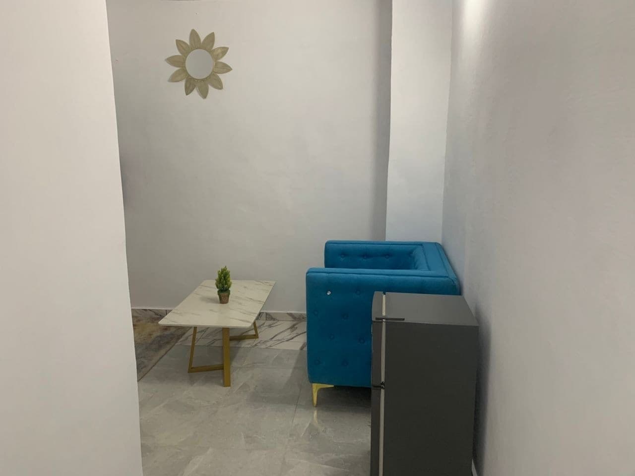 Le coin salon d'une chambre
